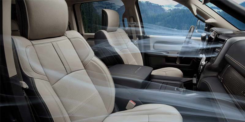View of the interior of a 2024 RAM 3500 HD with tan leather seats